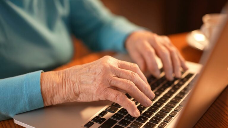 Proveer at Byrd Springs | Senior hands at laptop keyboard